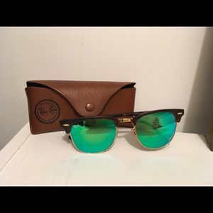 Ray Ban Sunglasses.